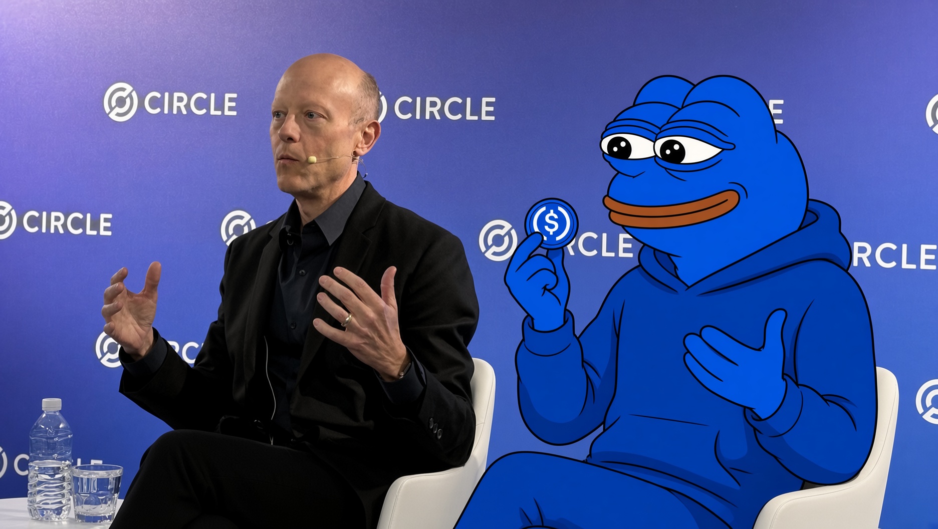 Blue Pepe seated beside Jeremy Allaire at a Circle panel